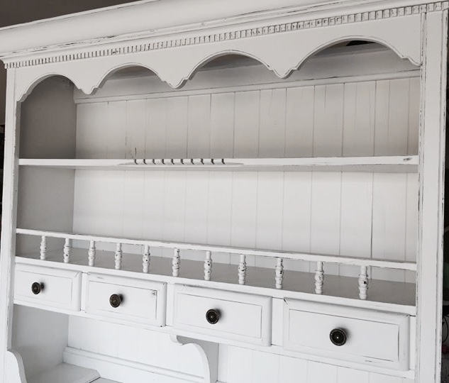 After image showing the result of an old farmhouse China cabinet painted white.