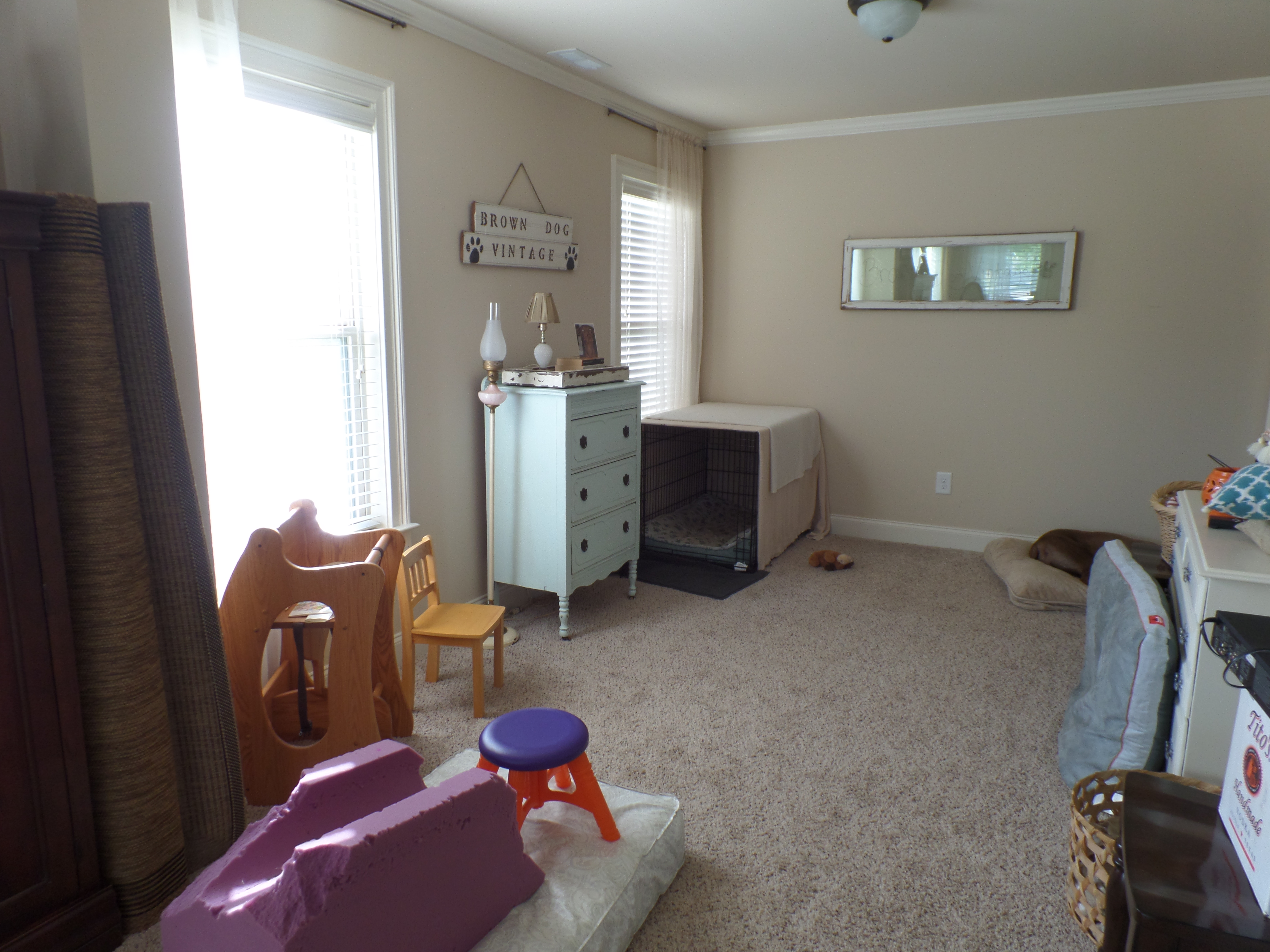 A cluttered master bedroom before a makeover.
