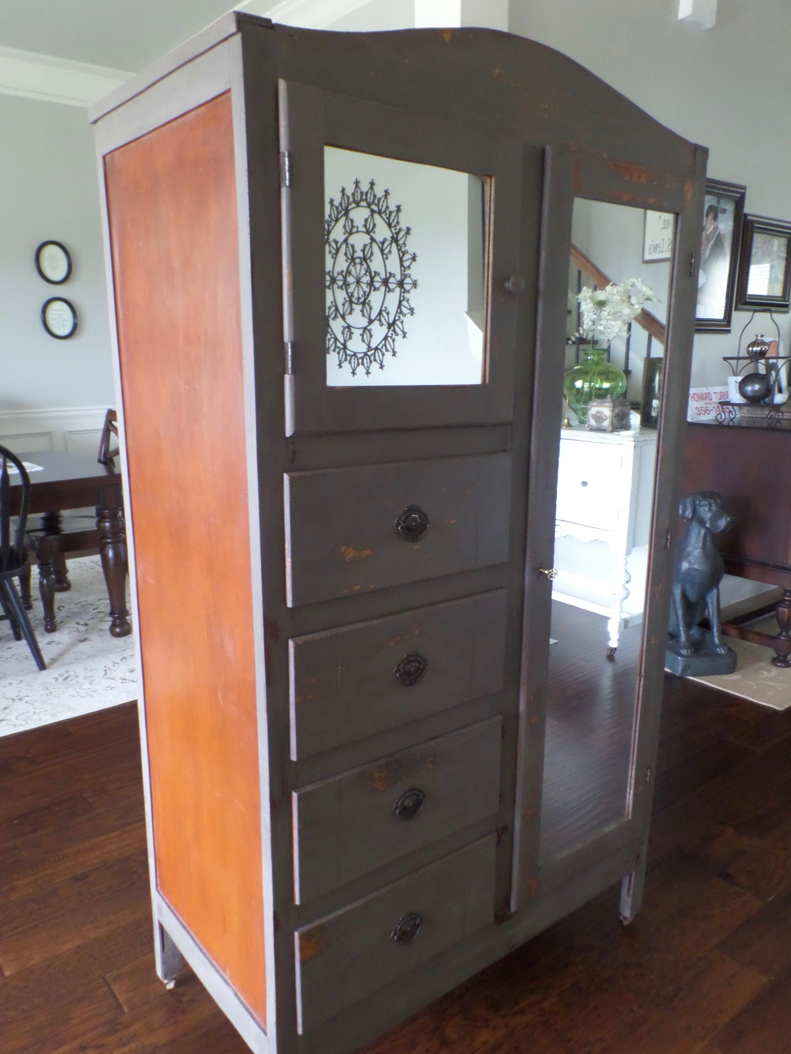 An after picture showing a chiffarobe makeover using milk paint.