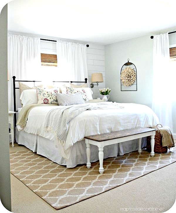 An inspiration photo for a farmhouse master bedroom makeover.