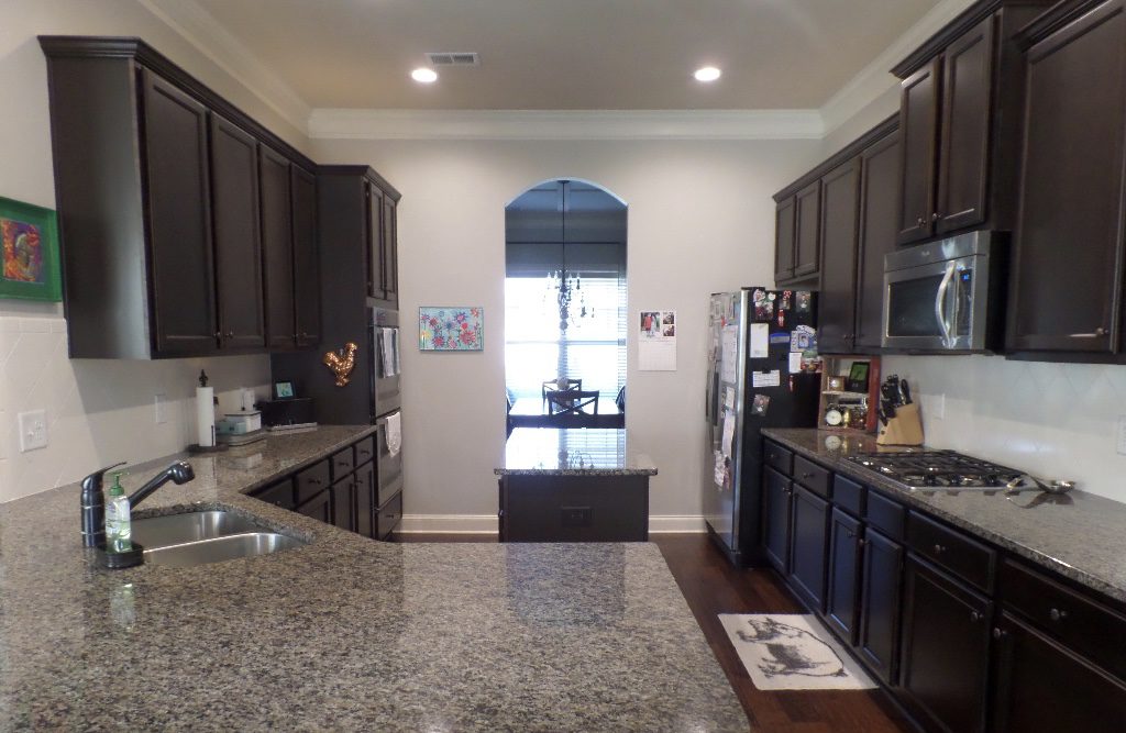 A brown and tan kitchen.