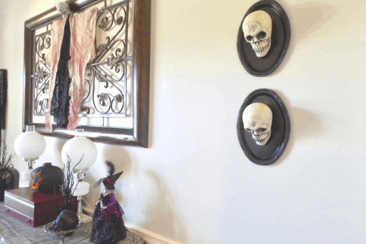 Halloween wall art made with skulls