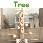DIY rustic Christmas tree using wood shims, dowels, and simple craft store supplies #createandfind #diytree #christmasdecor #diychristmasdecor #christmastree