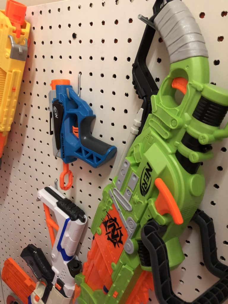 diy nerf gun wall with nerf guns hanging up