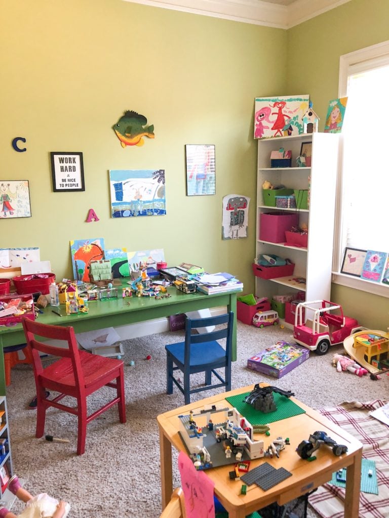 Playroom before picture of a messy play area.