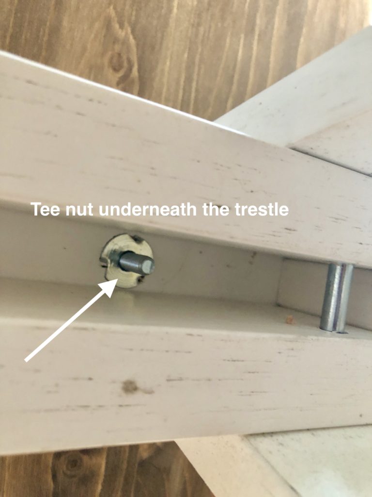 DIY desk instructions: showing tree nut underneath the trestle