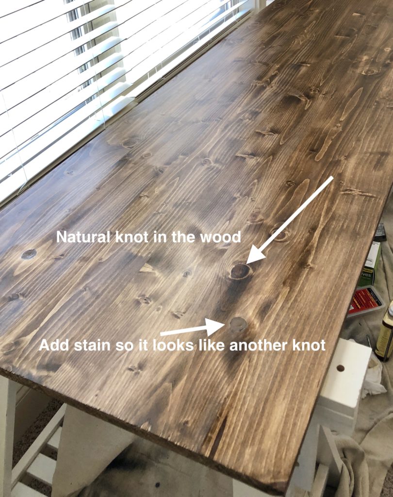 Stain added to wood filler so it looks like a natural wood knot