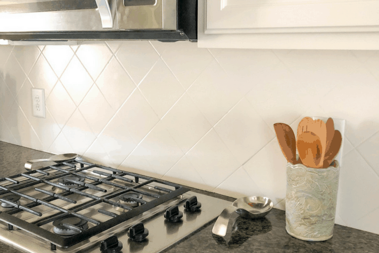 Painted kitchen backsplash 1 year after painting