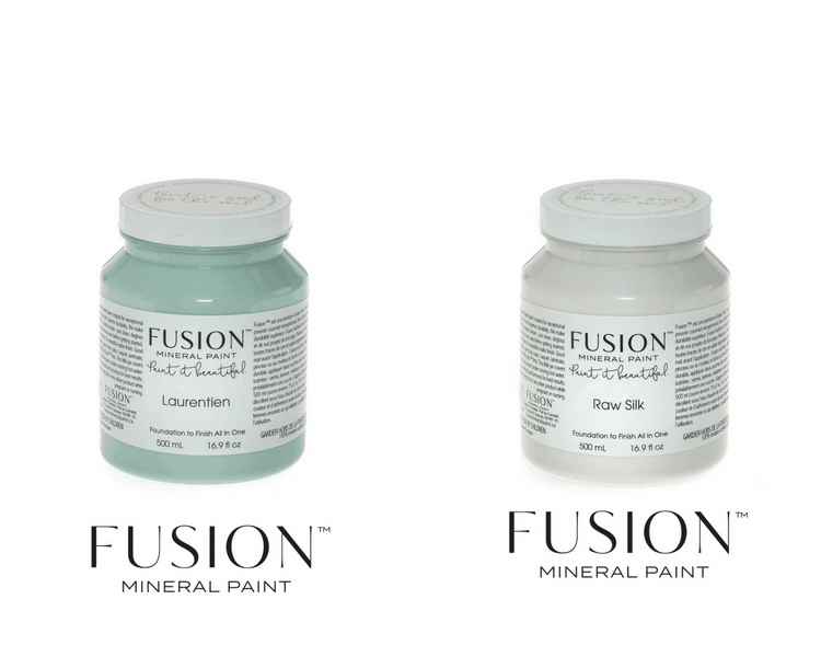 Teal and white Fusion vision paint containers on a white background.