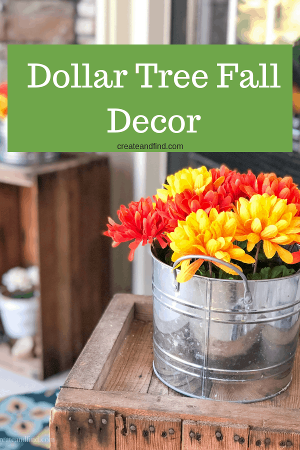 Pinterest graphic with text that reads \"Dollar Tree Fall Decor\" and a picture of red and yellow flowers in a metal container.