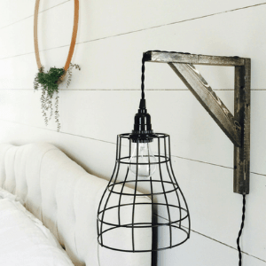 Modern farmhouse wall light in a master bedroom