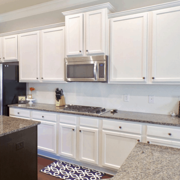 Painted tile backsplash in a remodeled kitchen