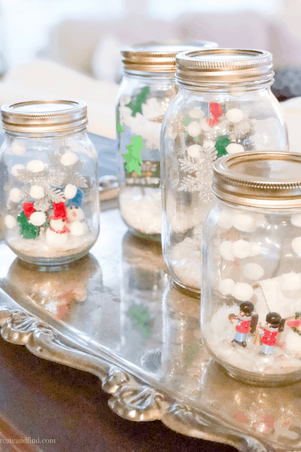 Homemade Christmas snow globe made from mason jars - an easy craft for kids