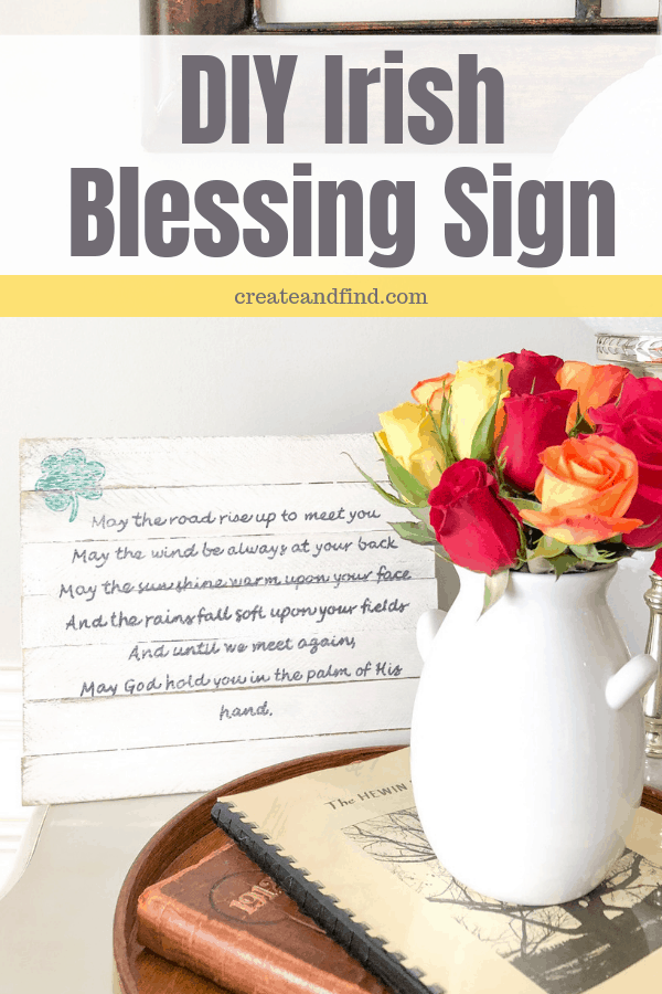 Pinterest graphic with text that reads \"DIY Irish Blessing Sign\" and a picture of a homemade sign with cursive writing next to roses in a white vase.