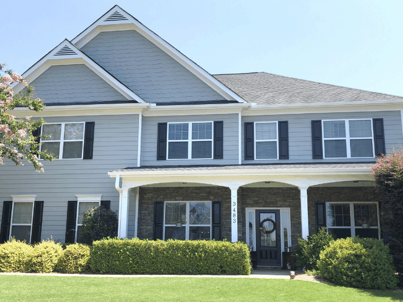 House painted with Sherwin Williams Ellie Gray on the exterior