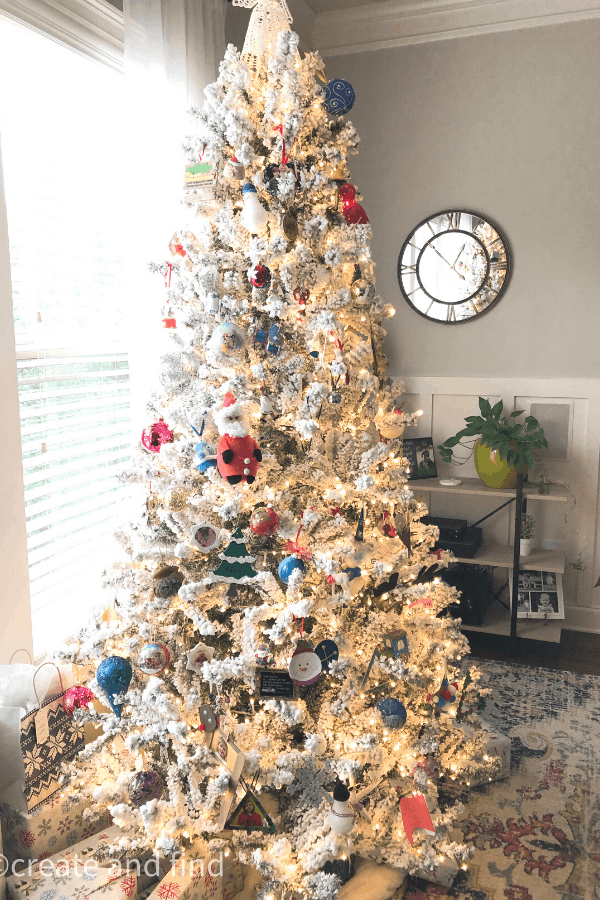 flocked Christmas tree with colorful ornaments