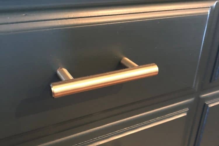 Closeup of a new hardware handle for a buffet