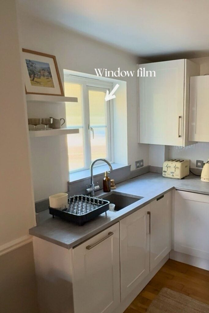 Privacy film on a kitchen window over the sink.