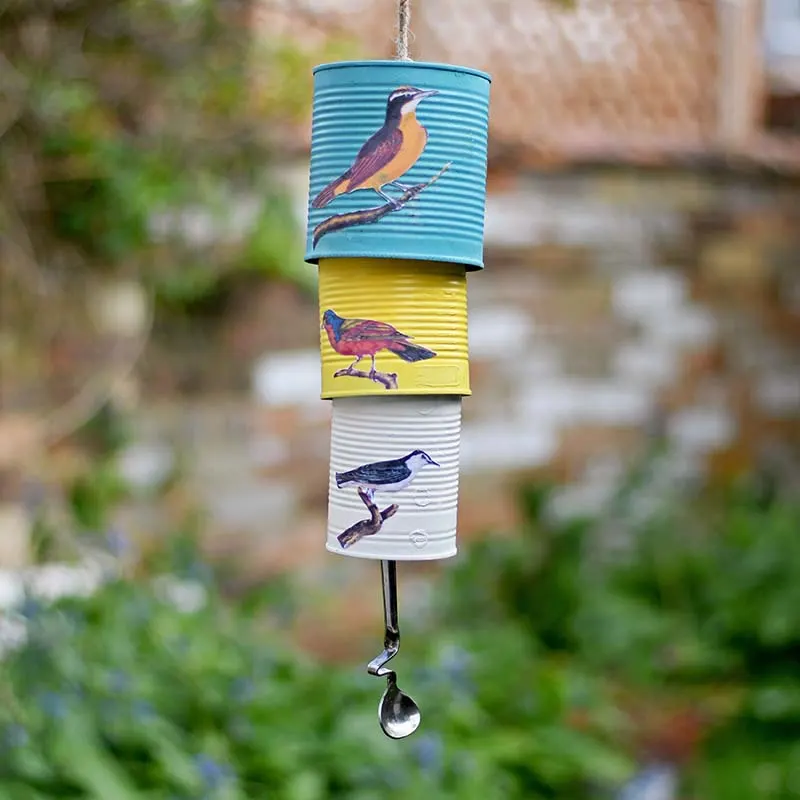 DIY tin can windchimes with decoupaged birds.